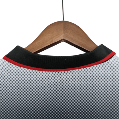https://cdn.shopify.com/s/files/1/0826/7228/8075/files/19951996-ac-milan-opel-training-black-retro-kit-classickits433-663971.webp?v=1741198817