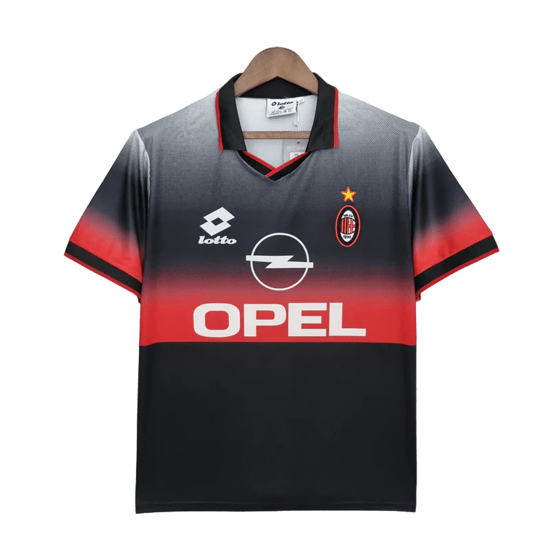 https://cdn.shopify.com/s/files/1/0826/7228/8075/files/19951996-ac-milan-opel-training-black-retro-kit-classickits433-729683.webp?v=1741198818