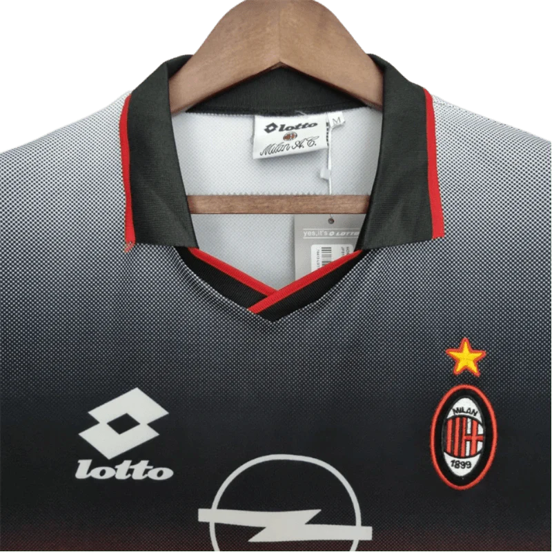 https://cdn.shopify.com/s/files/1/0826/7228/8075/files/19951996-ac-milan-opel-training-black-retro-kit-classickits433-920099.webp?v=1741198817
