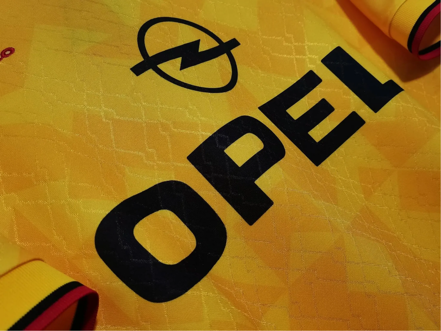 https://cdn.shopify.com/s/files/1/0826/7228/8075/files/19951996-ac-milan-opel-yellow-3rd-away-retro-kit-437682.webp?v=1741197276