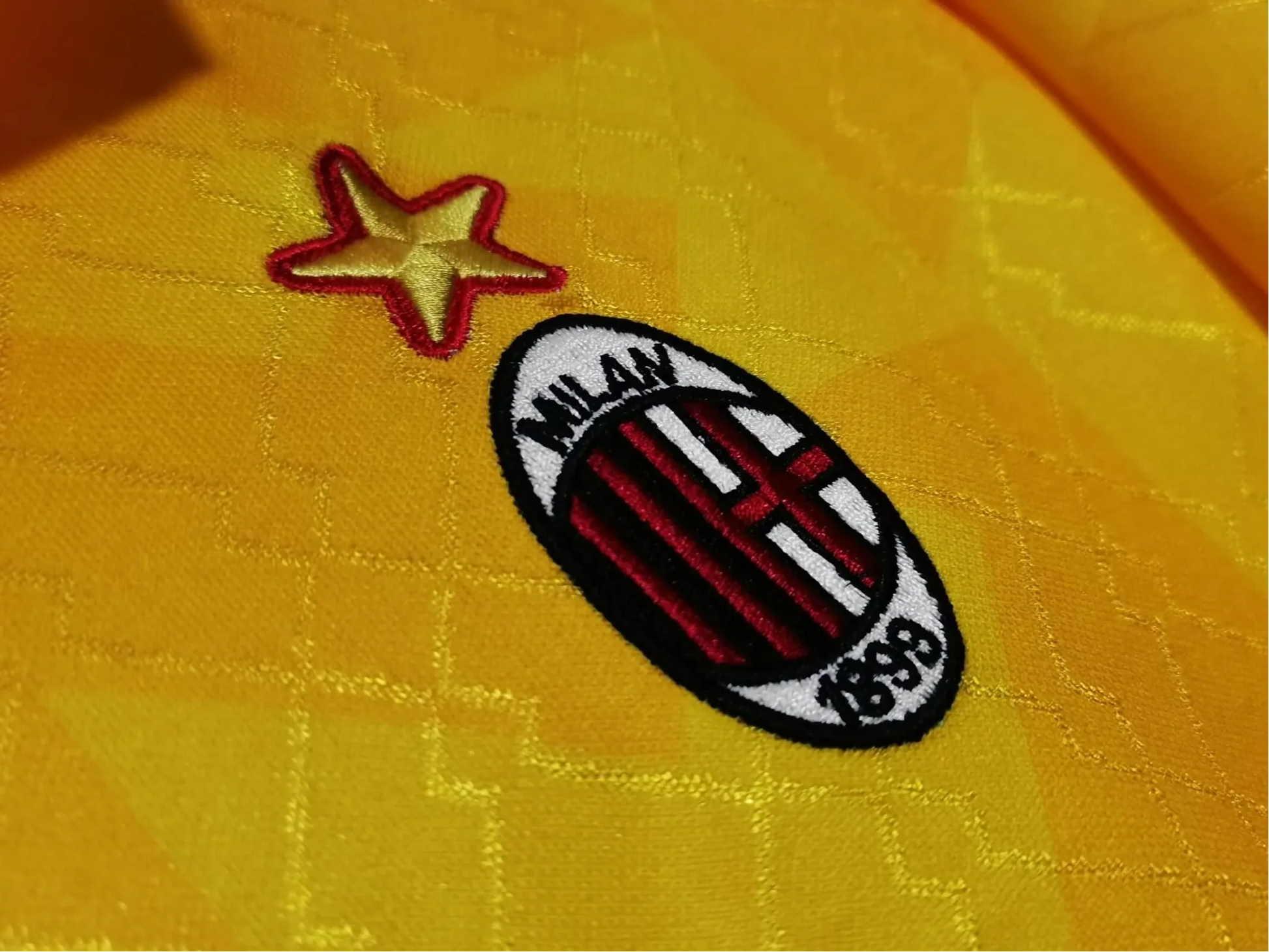https://cdn.shopify.com/s/files/1/0826/7228/8075/files/19951996-ac-milan-opel-yellow-3rd-away-retro-kit-625747.webp?v=1741197274