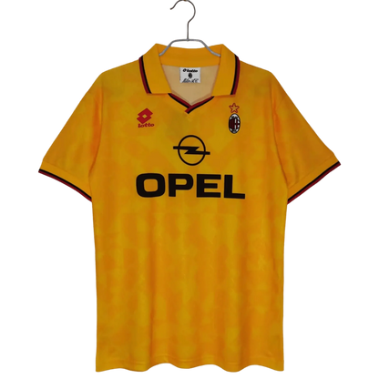 https://cdn.shopify.com/s/files/1/0826/7228/8075/files/19951996-ac-milan-opel-yellow-3rd-away-retro-kit-893702.webp?v=1741197276