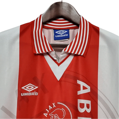 https://cdn.shopify.com/s/files/1/0826/7228/8075/files/19951996-ajax-abn-amro-home-retro-kit-classickits433-991236.webp?v=1741198355