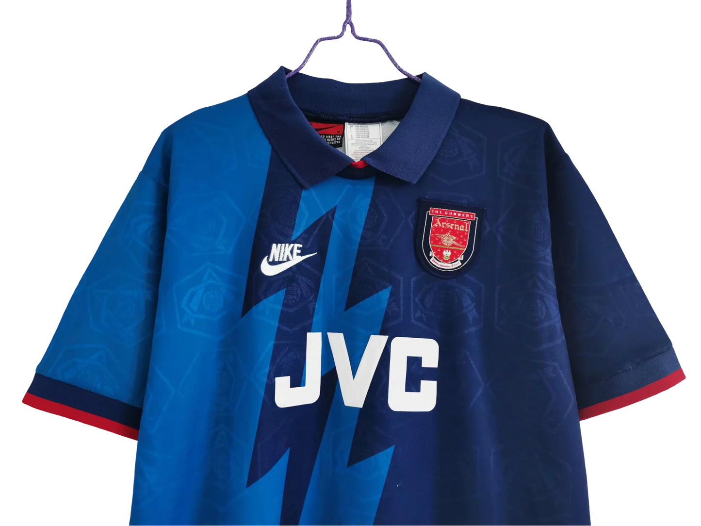https://cdn.shopify.com/s/files/1/0826/7228/8075/files/19951996-arsenal-jvc-blue-away-retro-kit-classickits433-108780.webp?v=1741199334