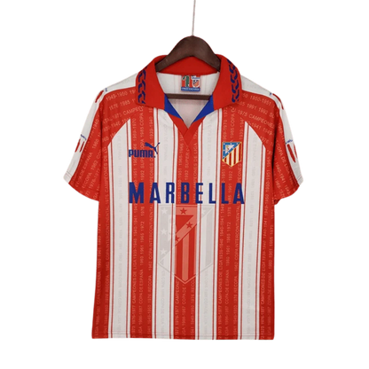 https://cdn.shopify.com/s/files/1/0826/7228/8075/files/19951996-atletico-madrid-marbella-home-retro-kit-classickits433-378979.webp?v=1741199014