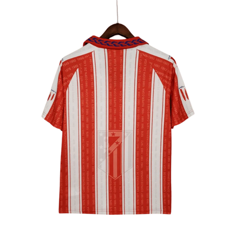 https://cdn.shopify.com/s/files/1/0826/7228/8075/files/19951996-atletico-madrid-marbella-home-retro-kit-classickits433-984985.webp?v=1741199014