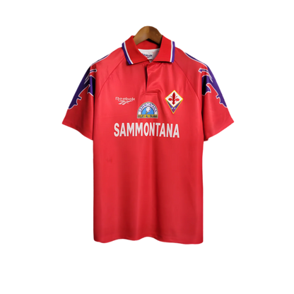 https://cdn.shopify.com/s/files/1/0826/7228/8075/files/19951996-fiorentina-florence-sammontana-third-retro-kit-classickits433-159591.webp?v=1741199046