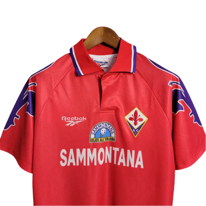 https://cdn.shopify.com/s/files/1/0826/7228/8075/files/19951996-fiorentina-florence-sammontana-third-retro-kit-classickits433-561940.webp?v=1741199044