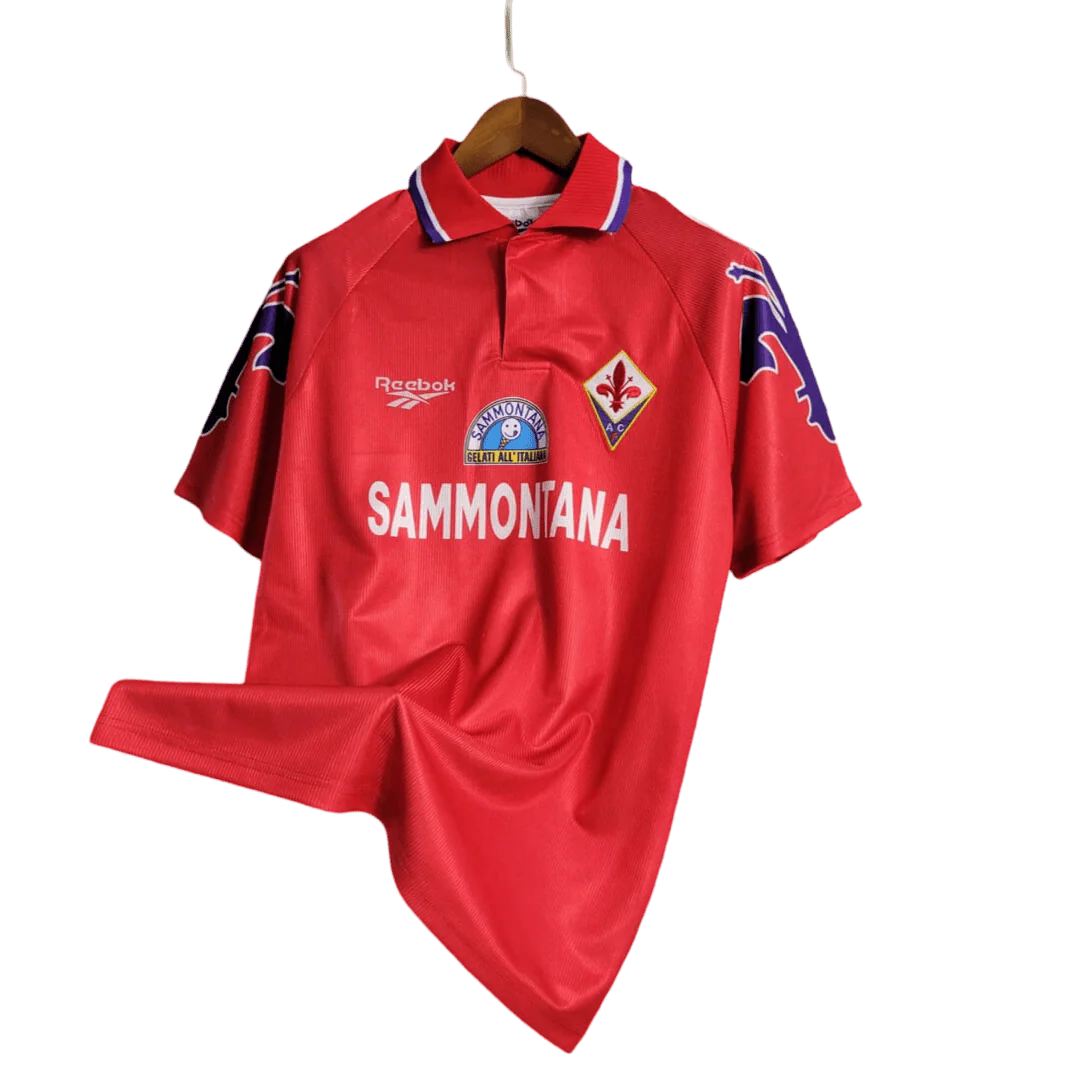 https://cdn.shopify.com/s/files/1/0826/7228/8075/files/19951996-fiorentina-florence-sammontana-third-retro-kit-classickits433-602342.webp?v=1741199043