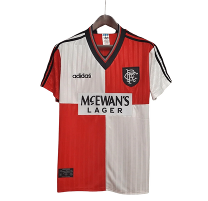 https://cdn.shopify.com/s/files/1/0826/7228/8075/files/19951996-glasgow-rangers-mcewans-lager-away-kit-classickits433-173454.webp?v=1741199018