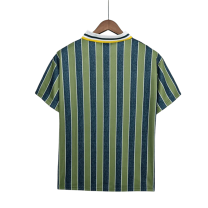 https://cdn.shopify.com/s/files/1/0826/7228/8075/files/19951996-inter-milan-pirelli-third-retro-kit-classickits433-326905.webp?v=1741198887