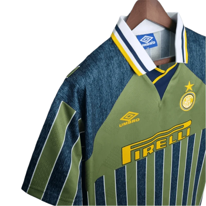https://cdn.shopify.com/s/files/1/0826/7228/8075/files/19951996-inter-milan-pirelli-third-retro-kit-classickits433-547333.webp?v=1741198865
