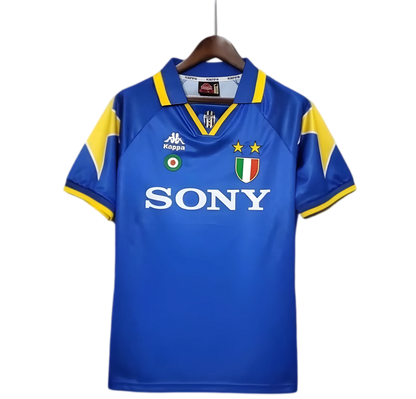 https://cdn.shopify.com/s/files/1/0826/7228/8075/files/19951996-juventus-sony-away-retro-kit-classickits433-542086.webp?v=1741198802