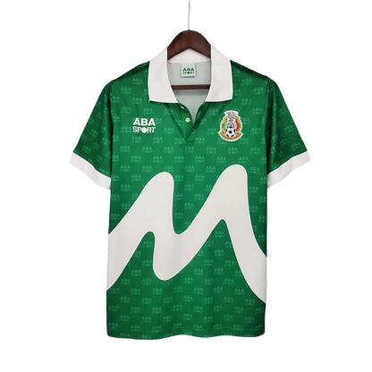 https://cdn.shopify.com/s/files/1/0826/7228/8075/files/19951996-mexico-home-retro-jersey-120348.webp?v=1741198782