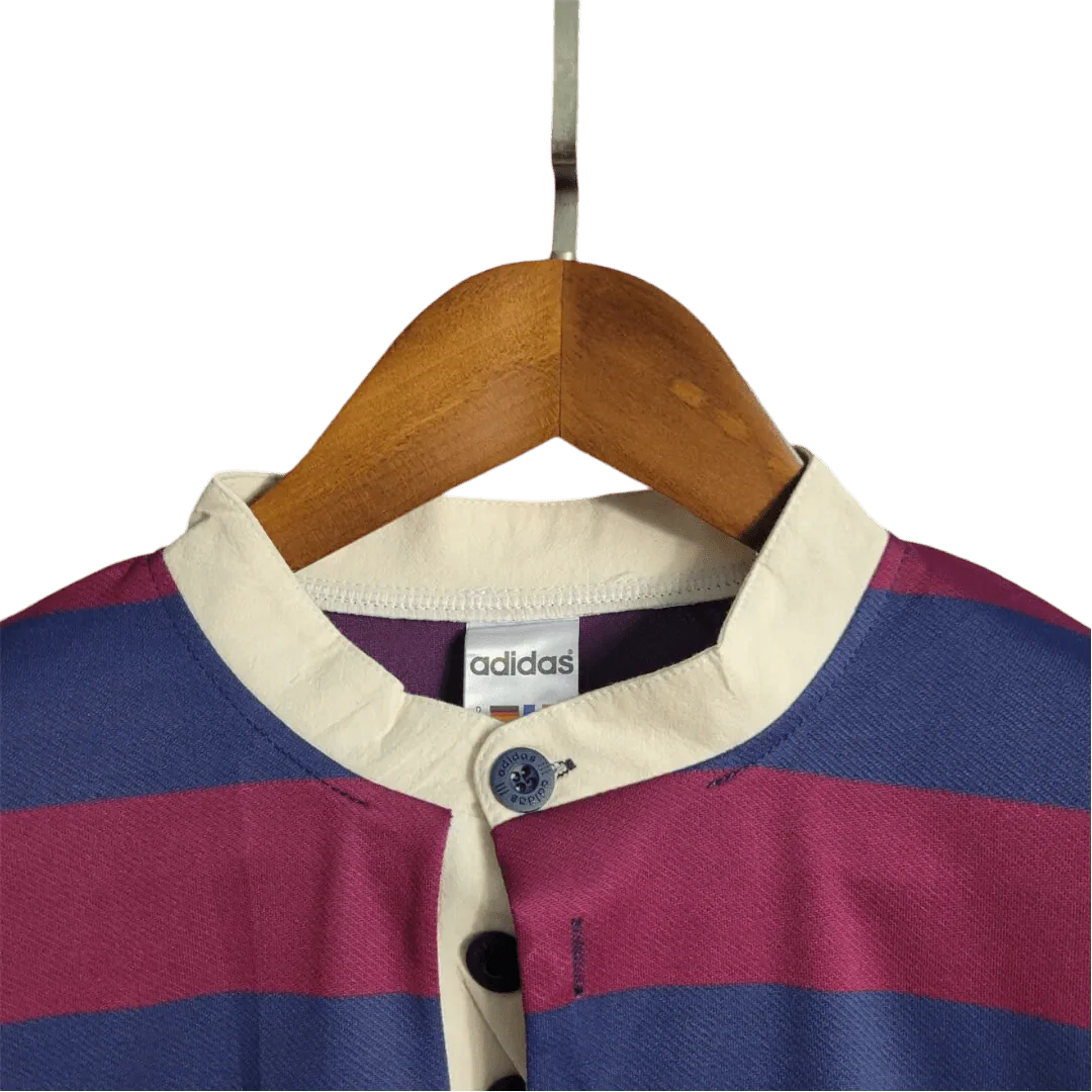 https://cdn.shopify.com/s/files/1/0826/7228/8075/files/19951996-newcastle-utd-away-retro-kit-long-sleeve-classickits433-264810.webp?v=1741197849
