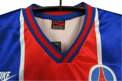 https://cdn.shopify.com/s/files/1/0826/7228/8075/files/19951996-paris-saint-germain-opel-home-retro-jersey-182238.webp?v=1741198001