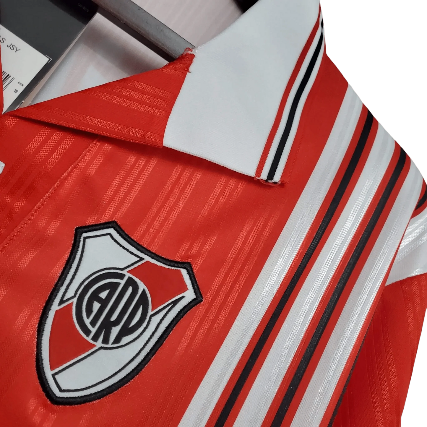 https://cdn.shopify.com/s/files/1/0826/7228/8075/files/19951996-river-plate-quilmes-away-retro-jersey-615924.webp?v=1741197178