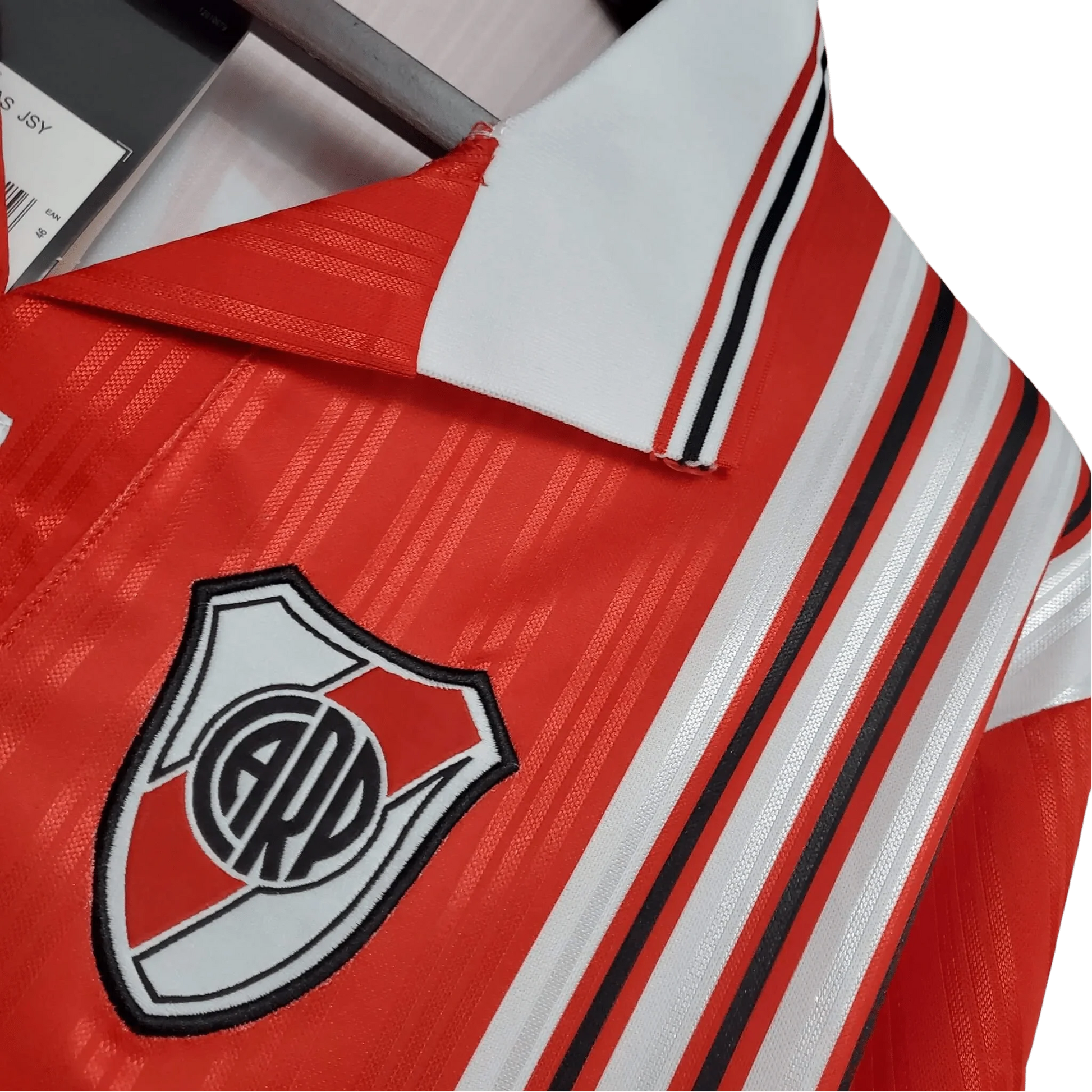 https://cdn.shopify.com/s/files/1/0826/7228/8075/files/19951996-river-plate-quilmes-away-retro-jersey-615924.webp?v=1741197178