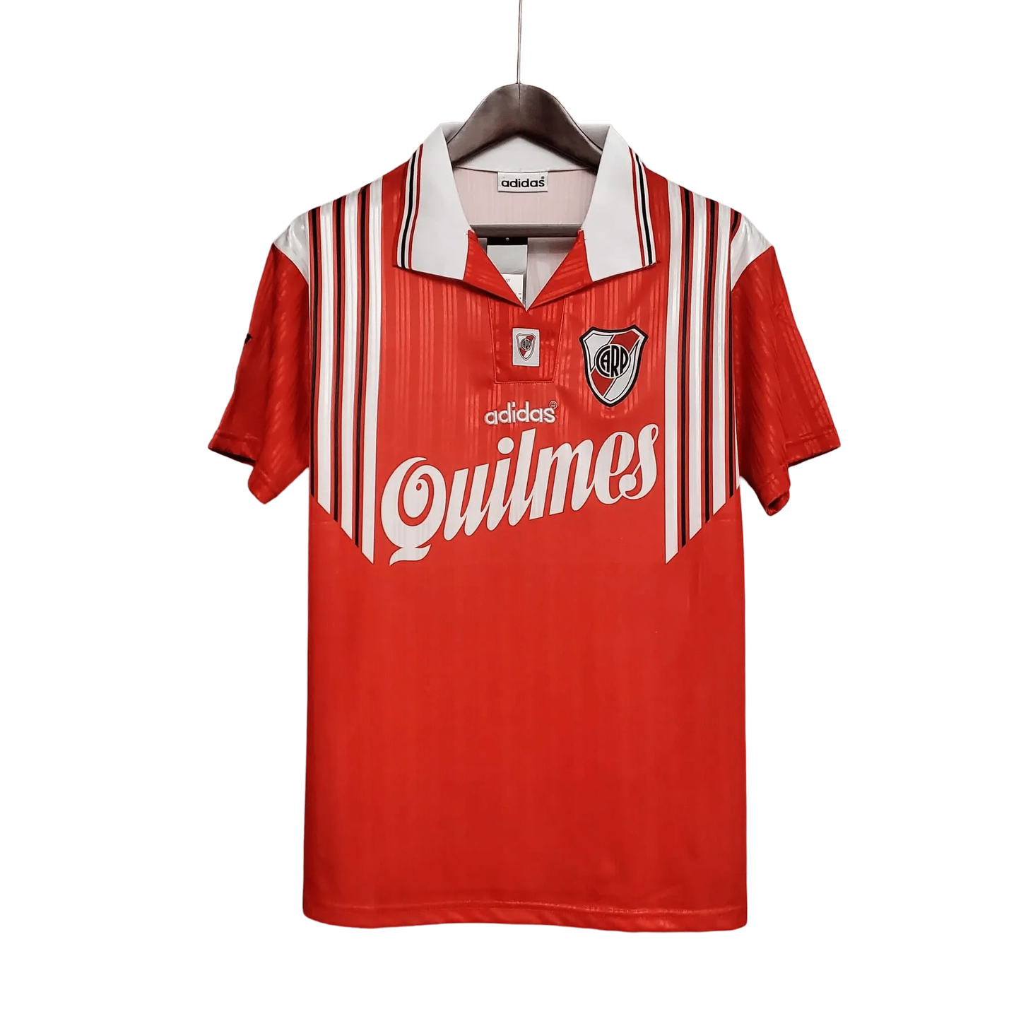 https://cdn.shopify.com/s/files/1/0826/7228/8075/files/19951996-river-plate-quilmes-away-retro-jersey-998996.webp?v=1741197181