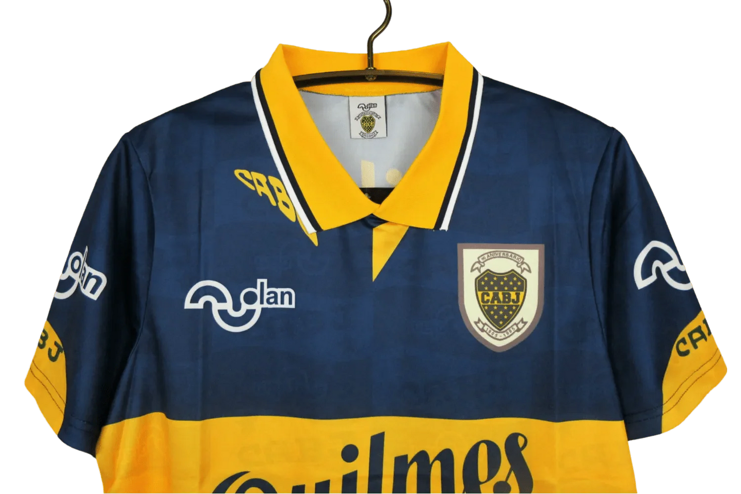 https://cdn.shopify.com/s/files/1/0826/7228/8075/files/19951997-boca-juniors-quilmes-home-retro-jersey-760166.webp?v=1741197187