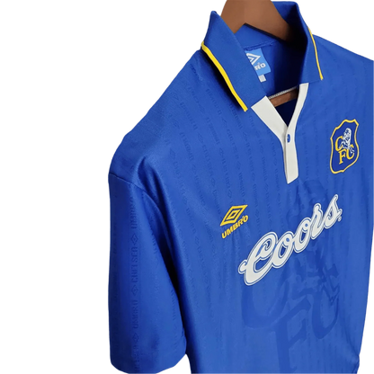 https://cdn.shopify.com/s/files/1/0826/7228/8075/files/19951997-chelsea-coors-home-retro-kit-classickits433-419107.webp?v=1741198262