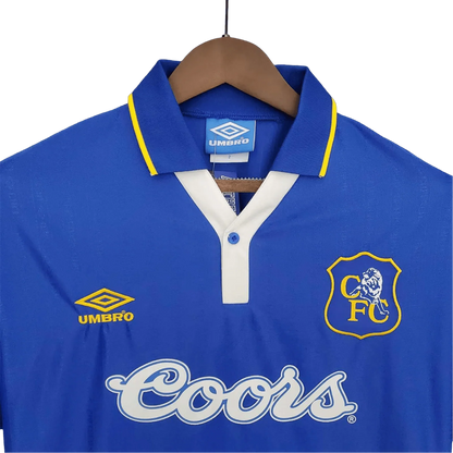 https://cdn.shopify.com/s/files/1/0826/7228/8075/files/19951997-chelsea-coors-home-retro-kit-classickits433-758636.webp?v=1741198264