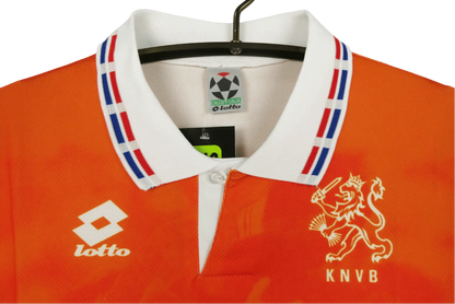 https://cdn.shopify.com/s/files/1/0826/7228/8075/files/1996-netherlands-home-kit-124525.webp?v=1741196944