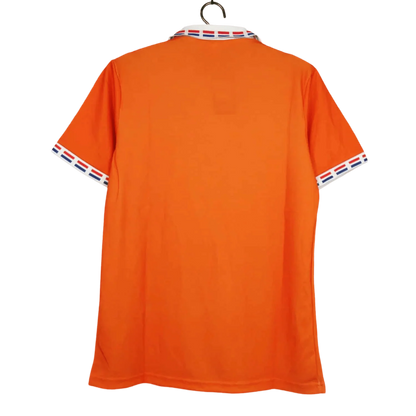 https://cdn.shopify.com/s/files/1/0826/7228/8075/files/1996-netherlands-home-kit-196446.webp?v=1741196943