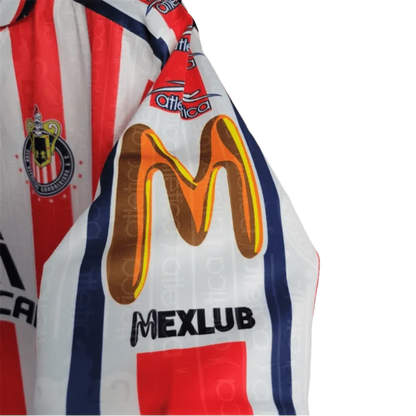 https://cdn.shopify.com/s/files/1/0826/7228/8075/files/19961997-chivas-guadalajara-mexicana-home-retro-jersey-146108.webp?v=1741197158