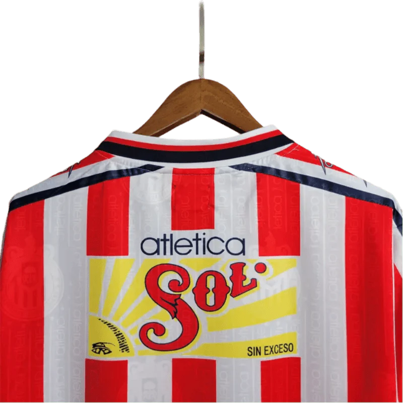 https://cdn.shopify.com/s/files/1/0826/7228/8075/files/19961997-chivas-guadalajara-mexicana-home-retro-jersey-166473.webp?v=1741197158