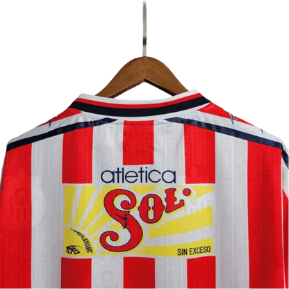 https://cdn.shopify.com/s/files/1/0826/7228/8075/files/19961997-chivas-guadalajara-mexicana-home-retro-jersey-166473.webp?v=1741197158