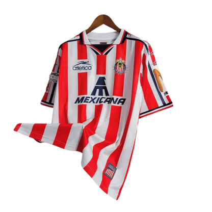 https://cdn.shopify.com/s/files/1/0826/7228/8075/files/19961997-chivas-guadalajara-mexicana-home-retro-jersey-229895.webp?v=1741197159