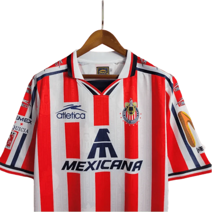 https://cdn.shopify.com/s/files/1/0826/7228/8075/files/19961997-chivas-guadalajara-mexicana-home-retro-jersey-892752.webp?v=1741197160