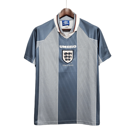 https://cdn.shopify.com/s/files/1/0826/7228/8075/files/19961997-england-away-retro-kit-classickits433-369906.webp?v=1741198525