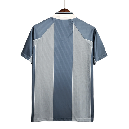 https://cdn.shopify.com/s/files/1/0826/7228/8075/files/19961997-england-away-retro-kit-classickits433-627247.webp?v=1741198525