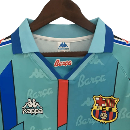 https://cdn.shopify.com/s/files/1/0826/7228/8075/files/19961997-fc-barcelona-away-retro-kit-long-sleeves-classickits433-338282.webp?v=1741197556