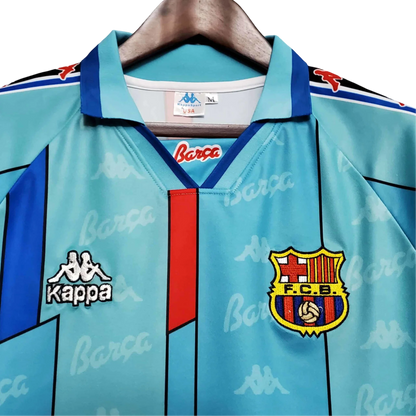 https://cdn.shopify.com/s/files/1/0826/7228/8075/files/19961997-fc-barcelona-turquoise-retro-kit-classickits433-597579.webp?v=1741199022