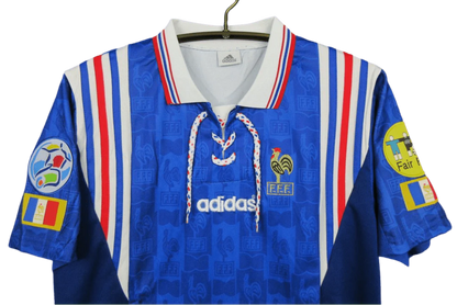 https://cdn.shopify.com/s/files/1/0826/7228/8075/files/19961997-france-home-retro-jersey-292983.webp?v=1741198518