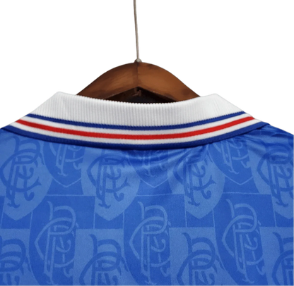 https://cdn.shopify.com/s/files/1/0826/7228/8075/files/19961997-glasgow-rangers-mcewans-lager-home-kit-classickits433-394650.webp?v=1741199171