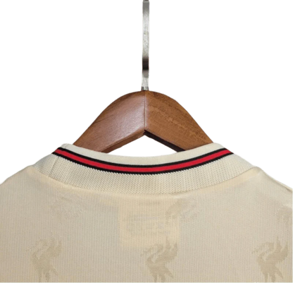 https://cdn.shopify.com/s/files/1/0826/7228/8075/files/19961997-liverpool-carlsberg-away-retro-kit-classickits433-555778.webp?v=1741199191