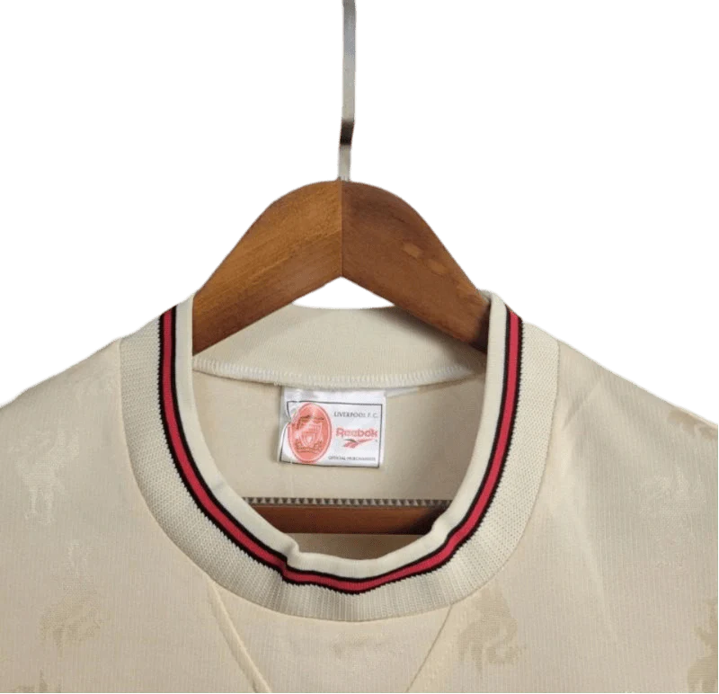 https://cdn.shopify.com/s/files/1/0826/7228/8075/files/19961997-liverpool-carlsberg-away-retro-kit-classickits433-761667.webp?v=1741199190