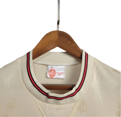 https://cdn.shopify.com/s/files/1/0826/7228/8075/files/19961997-liverpool-carlsberg-away-retro-kit-classickits433-761667.webp?v=1741199190
