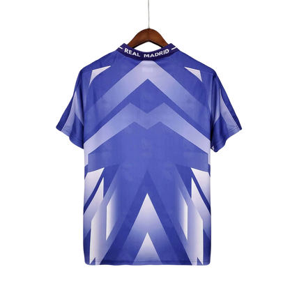 https://cdn.shopify.com/s/files/1/0826/7228/8075/files/19961997-real-madrid-teka-blue-away-retro-kit-classickits433-210286.webp?v=1741199046