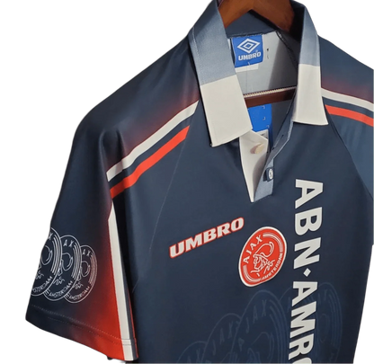 https://cdn.shopify.com/s/files/1/0826/7228/8075/files/19971998-ajax-abn-amro-away-retro-kit-classickits433-254214.webp?v=1741199340