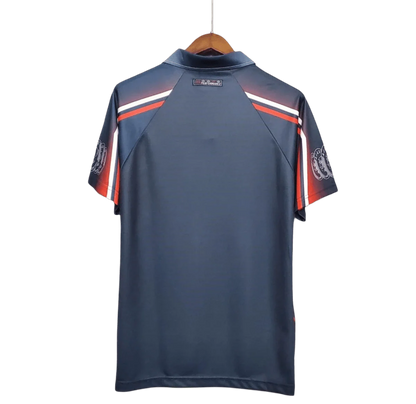 https://cdn.shopify.com/s/files/1/0826/7228/8075/files/19971998-ajax-abn-amro-away-retro-kit-classickits433-288650.webp?v=1741199341