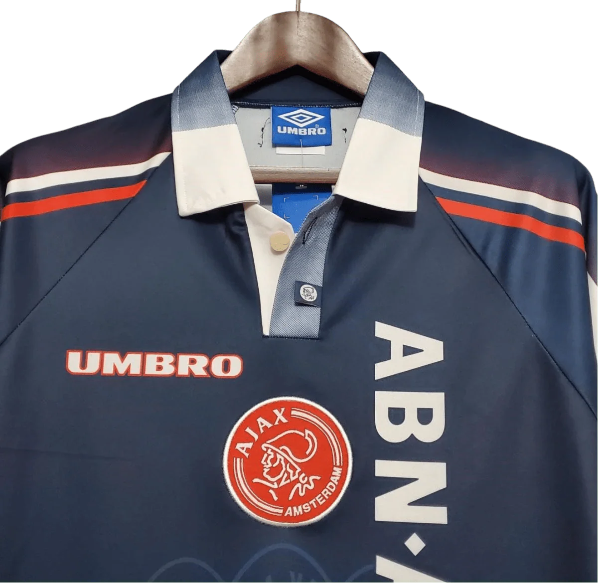 https://cdn.shopify.com/s/files/1/0826/7228/8075/files/19971998-ajax-abn-amro-away-retro-kit-classickits433-463852.webp?v=1741199340
