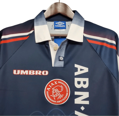 https://cdn.shopify.com/s/files/1/0826/7228/8075/files/19971998-ajax-abn-amro-away-retro-kit-classickits433-463852.webp?v=1741199340