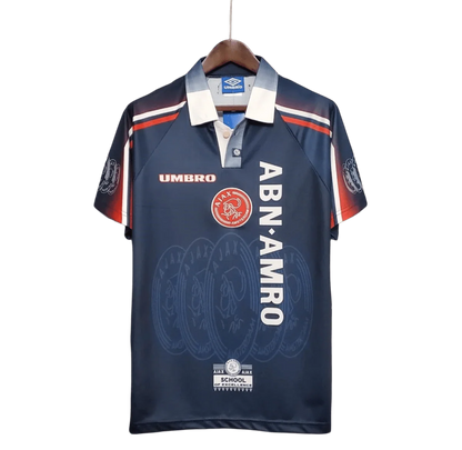 https://cdn.shopify.com/s/files/1/0826/7228/8075/files/19971998-ajax-abn-amro-away-retro-kit-classickits433-934234.webp?v=1741199338