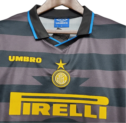 https://cdn.shopify.com/s/files/1/0826/7228/8075/files/19971998-inter-milan-pirelli-third-retro-kit-classickits433-240527.webp?v=1741198899