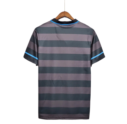 https://cdn.shopify.com/s/files/1/0826/7228/8075/files/19971998-inter-milan-pirelli-third-retro-kit-classickits433-547920.webp?v=1741198897